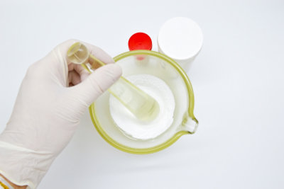 scientist testing powdered substance