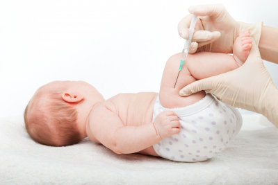 baby being injected or vaccinated