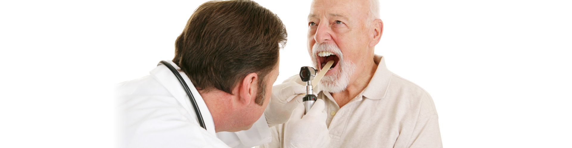 Doctor using a tongue depressor and an otoscope to look inside a senior patient's mouth. Isolated on white.
